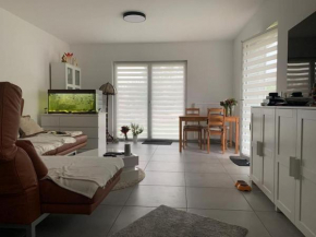 4 Zimmer im Neubau Bungalow, Garten, Grillen, bis 9 Personen